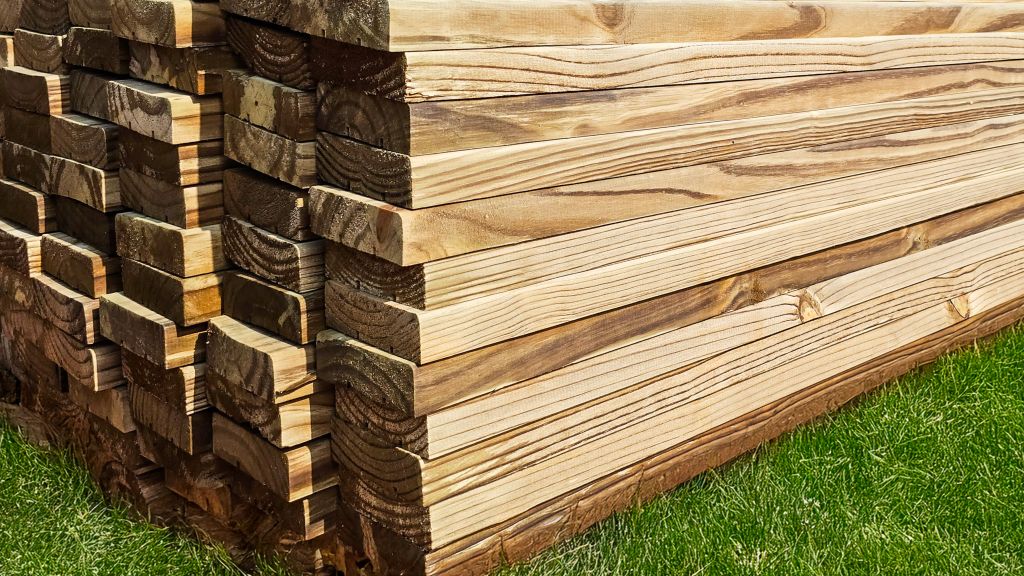 Treated lumber decking stacked and ready for orders.